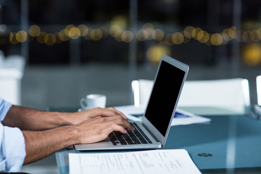 Businessman working on laptop in the office