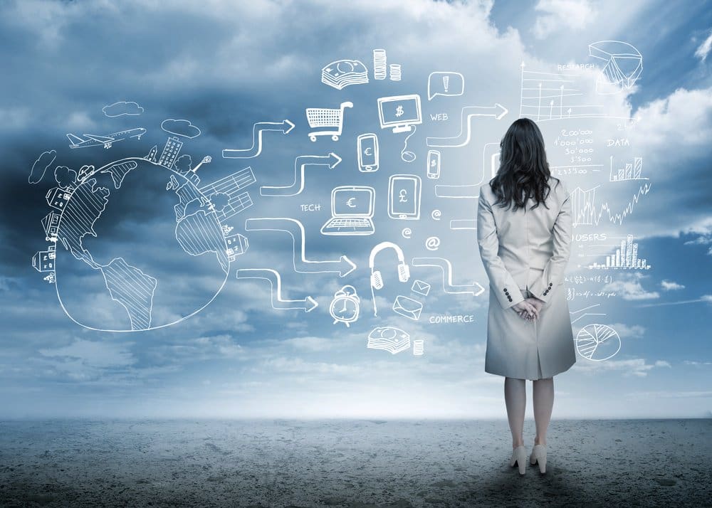 Businesswoman looking out at brainstorm drawings in cloudy landscape-1