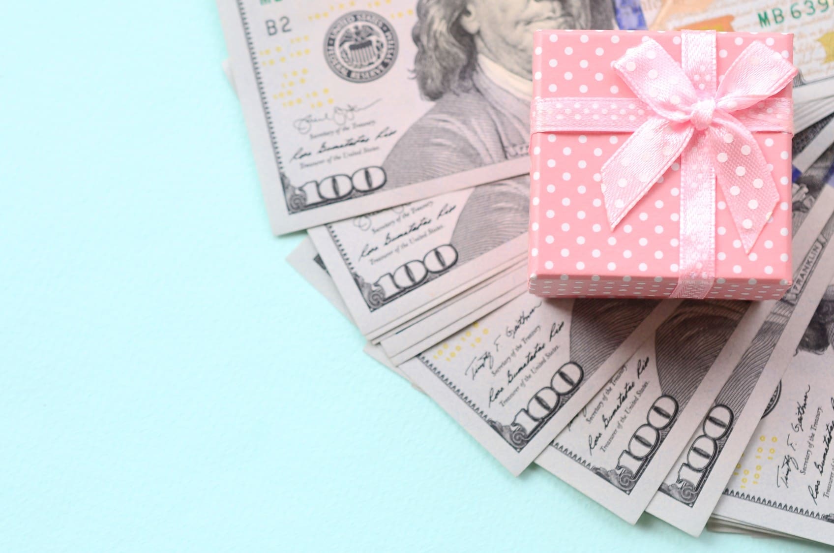 money-gift-box-dollar-cash-bow-white-isolated-present-bill-hundred-paper-currency-finance-ribbon_t20_RzAP8J