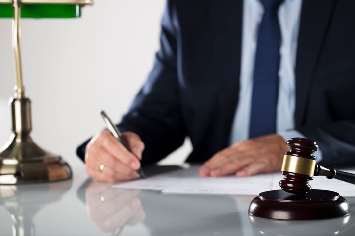 Law firm. Couselor concept. Law business. Signing agreement.